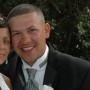 Smiling couple just wed at garden wedding in Myrtle Beach