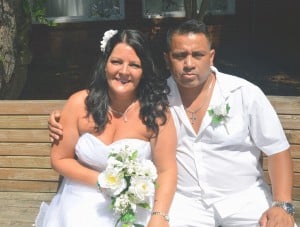 Rita & Hugo Corimanya wed on the beach at Wedding Chapel By The Sea in Myrtle Beach, SC.